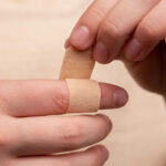 how to bandage finger tip